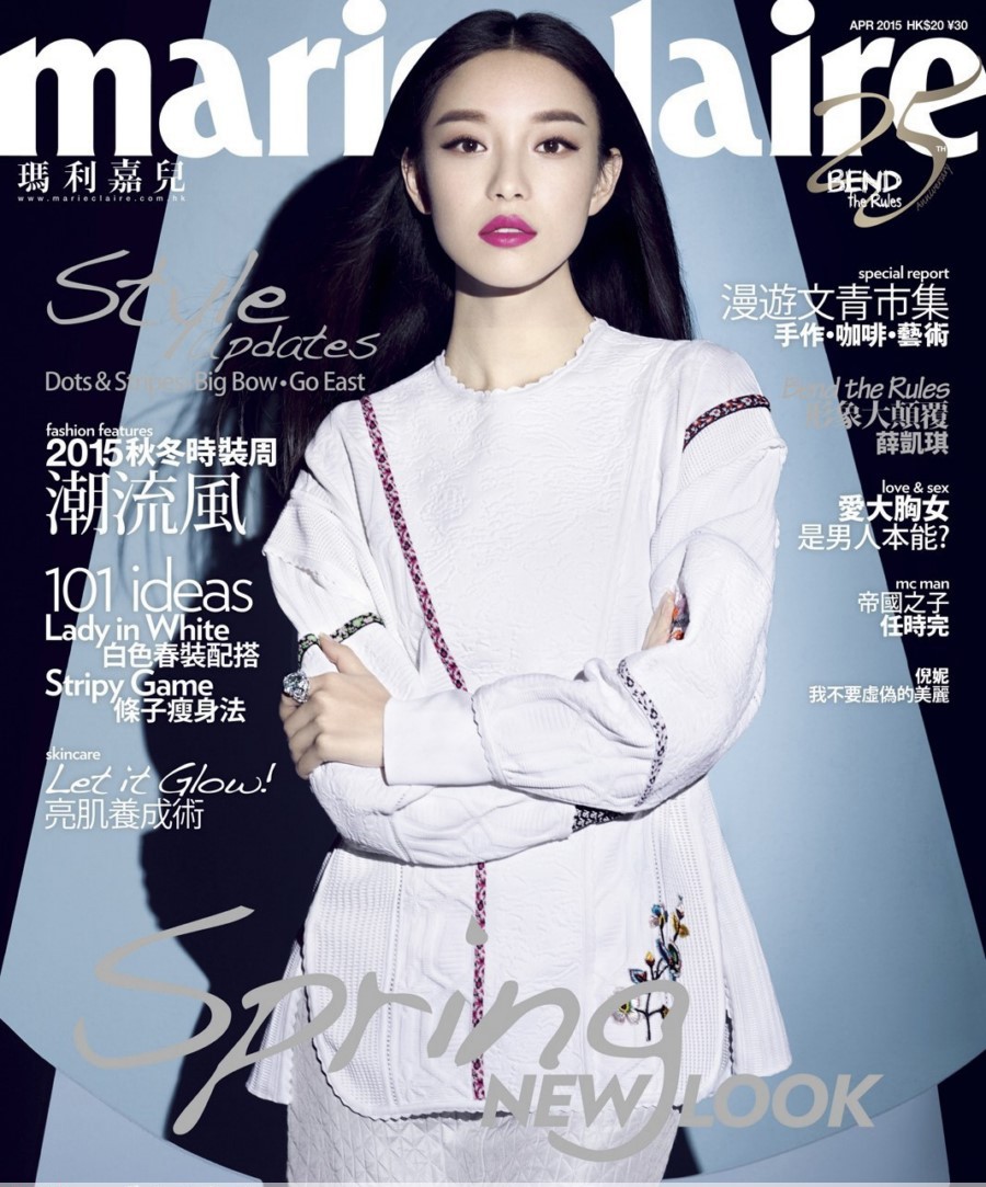 倪妮侧身立于几何光影中展现曼妙身体曲线