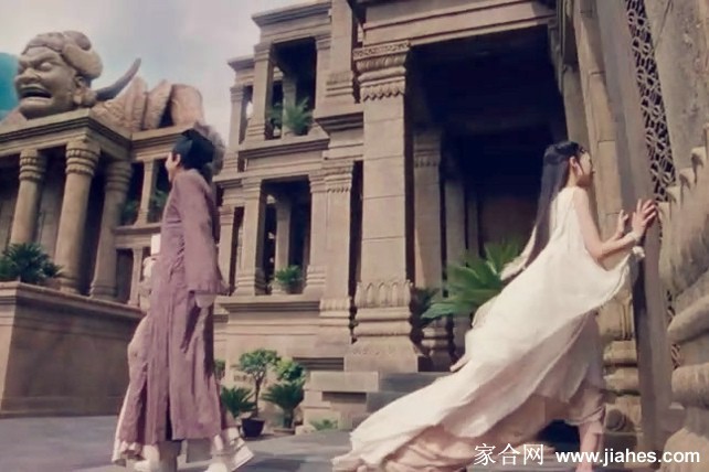 牡丹仙子轻抚花瓣嫣然浅笑，身后繁花似锦，仿佛与万花林的自然灵秀融为一体