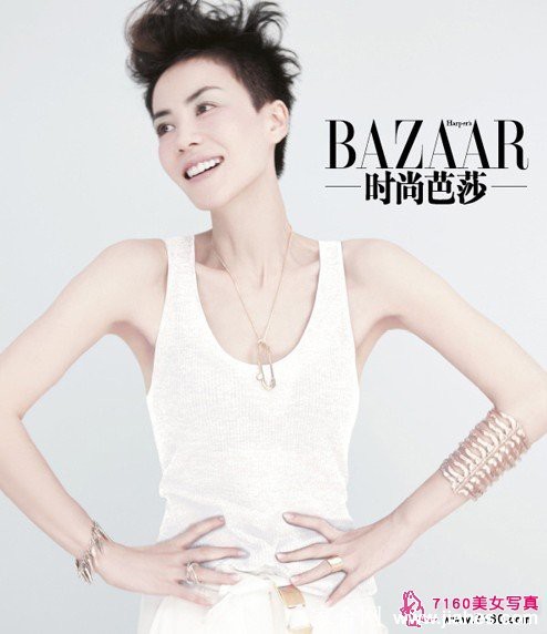 王菲侧脸特写，光影勾勒出清晰下颌线，展现冷峻而优雅的侧面轮廓